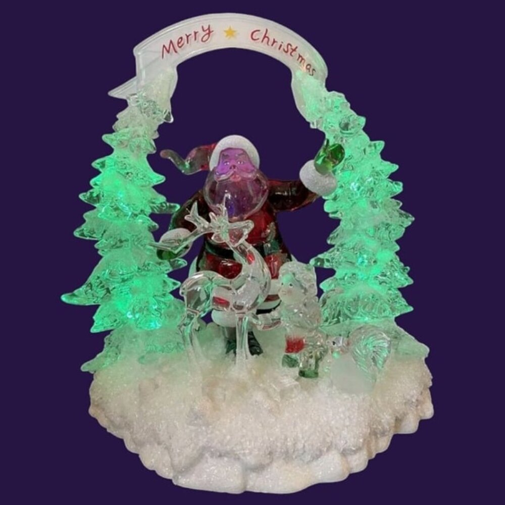 Heritage ice sculpture merry christmas santa lighted